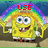 Yellow cartoon character with wide eyes and a big smile stands under a rainbow, wearing white gloves and red shorts.