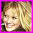 Four -aligned show a person with long blonde hair and light skin, each bordered by solid color. The person's head position shifts slightly across the
