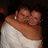 Two people embrace in a dimly lit setting with text reading "Rest In Peace Scott" and "11/16/07" visible.