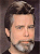 Pixelated static image of a man's face with dark hair and beard, rendered in low-resolution 8-bit style on a gradient background.