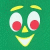 Pixelated cartoon face with green background, yellow eyebrows and mouth, white eyes with red pupils, and a small yellow nose.