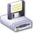 Pixelated icon of a floppy disk drive with a yellowed 3.5-inch floppy disk inserted, showing visible text lines on the disk label.