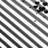 A static image of diagonal black and white stripes with a small cluster of black and white pixels in the top-right corner.