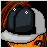 Pixelated 4-frame contact sheet showing an animated character in orange jumpsuit with black helmet and tattoos, transitioning to text "im one" and "BAD BITCH" on black background.
