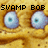 Pixelated yellow creature with large blue eyes and teal pupils, displaying text "SVAMP BOB" then "PWNS!!"