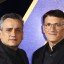 Static 64x64 pixel buddy icon showing two men in dark clothing with a glowing blue and yellow vertical shape between them against a purple background.