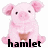 Pixelated pink pig with brown belly patch, black eyes and nose, sitting upright with arms crossed, text below reads 'hamlet' in black font.