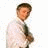 Pixelated image of a person in light clothing holding an object, with blue and gray text displaying 'Chad Michael Murr', 'is', and 'HOTTII' on a white background