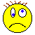 Yellow pixelated face with brown spiky hair, blue eyes showing different pupil positions and mouth expressions across frames.