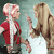 Two pixelated figures face each other; one wears red and white clothing while the other has long blonde hair and brown clothing.