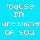 'cause I'm dreaming of you text in pixelated font with star symbols and color variations on blue background.