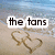Beach scene with two hearts drawn in sand, text overlays changing across frames to form a phrase.
