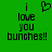 Green background with pixelated text reading 'i love you bunches!!' and a heart symbol above the word 'love'.