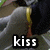 A pixelated image of a person in dark clothing with a yellow belt, showing text overlays that change across frames.