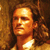 Pixelated close-up of a person with long hair, wearing a light-colored garment, against a warm-toned background with visible pixelation and no text.