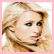 A pixelated 54x54 buddy icon featuring a blonde woman's face on the left and pink text "P.H." on the right, framed by a light pink border.