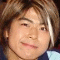 12 shows a person with light brown hair and a light blue shirt, with red text appearing and changing above their head across the