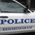 Static pixelated image of a vehicle with partial text 'POLICE' and 'SHERIFF' visible on its side.