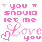 Pink pixelated text and heart symbols repeat in a pattern on white background with gray bottom-right corner