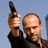 A static image shows a man holding a handgun against a blue sky background with text elements.