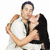 A pixelated static image shows a man in a white tank top holding a woman in a black dress against a white background.