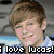 A four- shows a person with light brown hair in various poses, including smiling and standing shirtless by water, with text reading "i love lucas!" across the bottom of each