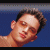 small square images showing multiple young men in red and black shirts against a blue background, with 'Dream Street' text visible