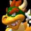 Animated sequence of a cartoon dragon-like character with orange spikes, green headband, and yellow body showing facial expression changes against black background.