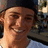 A pixelated image shows a person wearing a dark cap and light shirt, with orange text reading 'ryon sheckler (333)' on the right side.