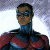Pixelated figure in blue and red costume with dark mask against light background, static image with visible pixelation and color blending.