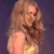A pixelated image of a woman with long blonde hair in a yellow dress against a purple background, next to green text reading 'Original Icons .com' on dark green.