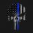 Pixelated static image with dark background, blue vertical stripe, and scattered light gray shapes resembling fragmented text or symbols.