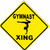 Yellow diamond-shaped sign with black border and text, surrounded by yellow and gray containing stylized text fragments