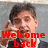A person with dark hair in a black and white outfit makes hand gestures against a gray background, with red text reading Welcome back my naughty little monkeys!.
