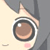 Pixelated close-up of a character's eye with brown iris, white highlight, and pink cheek blush on light skin.