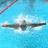 A pixelated image shows a dark-colored submarine with a light-colored conning tower against a blue background with white cloud-like shapes.