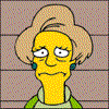 Yellow-skinned cartoon character with blonde hair and green earrings in three poses against a background