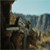 A pixelated landscape with rocky terrain, a stone structure, and blue sky background showing animation changes in the lower-right corner.