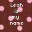 Brown background with pink polka dots and white pixelated text reading "Leah is my name don't wear it out!".