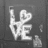 Pixelated grayscale icon shows a figure holding a heart shape, with text "September 24th 2007" and a heart symbol on a black background.