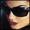 A close-up of a person wearing dark sunglasses with red lipstick and lip piercings, showing subtle animation changes across four