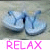 Four display light blue flip-flops on a textured background with text overlays changing across the top and bottom
