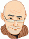 Pixelated cartoon-style icon of a bald man with glasses and a brown turtleneck sweater, static image on white background.