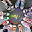A circular icon with a gray center displaying 'NCTS' in yellow text, surrounded by a purple ring and multiple small figures in various colors.