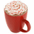 Red mug filled with light brown liquid topped with swirled white foam, next to blue pixelated text reading 'Cinnomin? You Read My Mind! Merry XMas To All!' on a white background.
