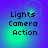 Four identical display 'Lights Camera Action' text over a blue-green gradient background with subtle circular light effects