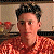 A split-frame contact sheet showing a pixelated person in an orange patterned shirt on the left and green text reading "Original Icons .com" on the right against a dark background.