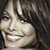 A static contact sheet showing two frames of a Janet Jackson-themed buddy icon with sepia-toned portrait and signature text.