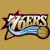 Pixelated graphic with stylized text 'NBA' in white and black, blue wave-like shape below, red accents on left side, against solid tan background.