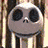 Animated icon featuring Jack Skellington, a skeletal figure with large black eyes and striped shirt, transitioning to a hooded figure against dark background.